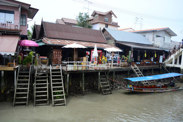 house and canal in Thailand