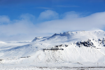 Fototapeta na wymiar Snowy mountain landscape in Iceland