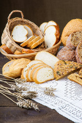Sliced bread on a tablecloth and in a basket