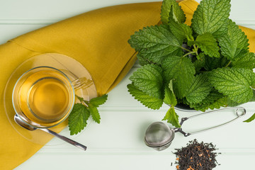 Herbal tea with melissa in a glass cup