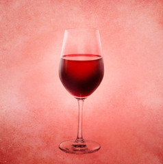 Red wine glass vintage style on old paper background