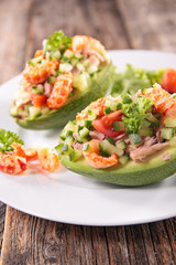 salad in avocado bowl