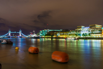 Fototapeta na wymiar Tower Bridge & South Riverside at night.