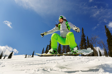 Snowboarder jumping