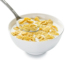 Cornflakes in the bowl on white background.