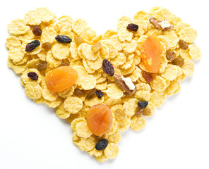 Cornflakes arranged in the shape of heart.