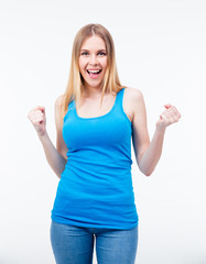 Fototapeta premium Pretty casual woman celebrating a triump