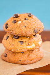 Stack of three chocolate chip cookies