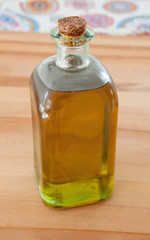 Bottle of golden olive oil