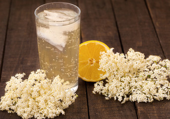 Elder flower refreshment with ice and lemon