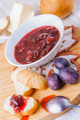 Roll with plum jam for breakfast