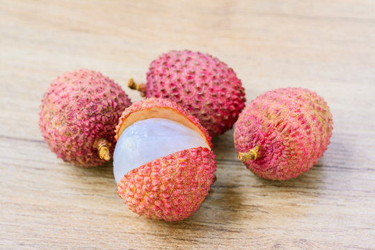 Fresh lychee on a wooden background