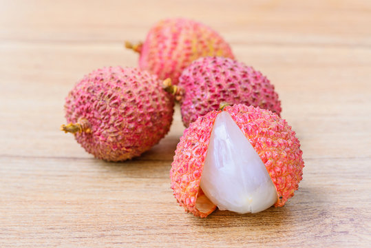 Fresh lychee on a wooden background