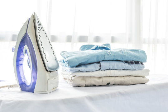 ironing, clothes, housework and objects concept