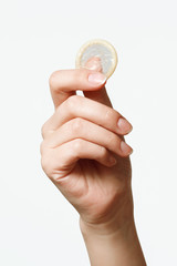 condom in female hand