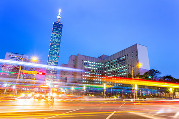 Fototapeta premium traffic blurred motion and office buildings