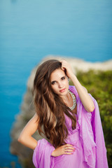 Naklejka premium Beautiful young woman bride outdoor