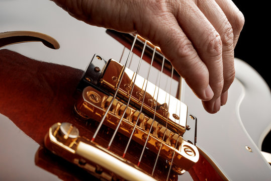 hand playing guitar