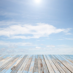 wooden floor with beautiful blue sky scenery for background