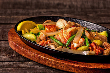 Stew chicken with vegetables and mushrooms