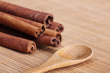 Cinnamon and wooden spoon