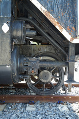 Fototapeta na wymiar Metal details and wheels of the steam locomotive