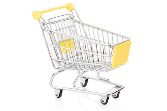 Yellow shopping cart on white, clipping path