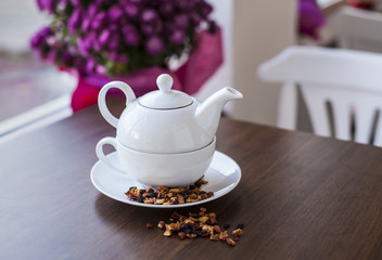Рorcelain teapot with dried fruit