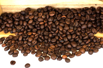 coffee beans in wood box on white