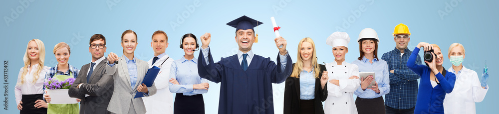 Wall mural happy bachelor with diploma over professionals