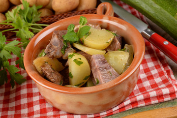 Boiled meat with potatoes and zucchini 
