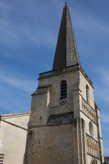 Fototapeta na wymiar Beautiful top of the church in France under blue sky