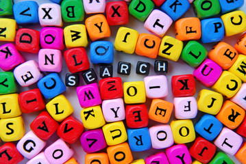 muticolor mixed  letters and black word search