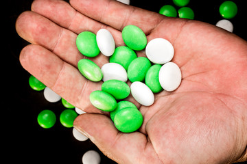 Mints in a hand's palm