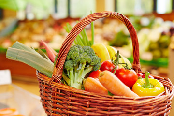 Colorful fresh vegetables in shopping basket