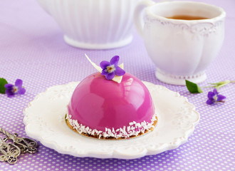 Obraz na płótnie Canvas Bush blueberry cake with cream and creamy mousse.