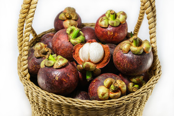 fresh mangosteen in handicraft basket, Thai fruit