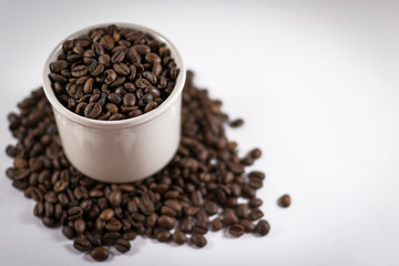 Pile of Coffee Beans in a Mug with Defocus