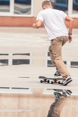 guy is going to skateboard at skatepark outdoor