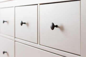 white wooden chest of drawers