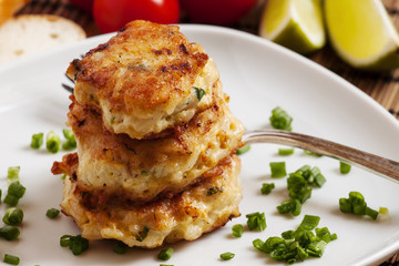 Homemade chicken cutlets sprinkled with green onion, selective f