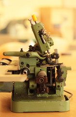 green vintage sewing machine, overlock