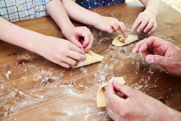 Cooking together with children manti (Central Asia dumplings)