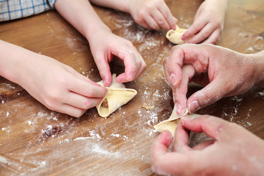Cooking together with children manti (Central Asia dumplings)