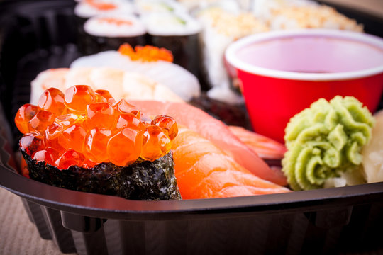 Selective focus of salmon caviar ikura sushi