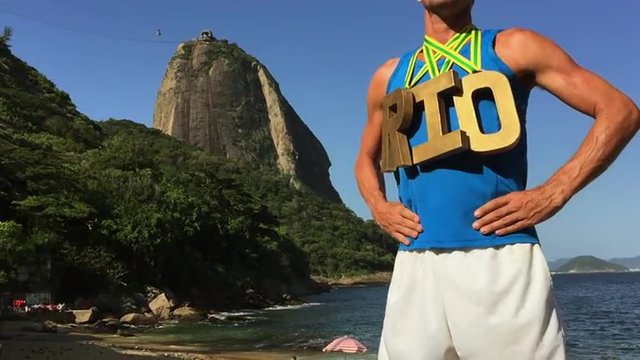 Gold Medal RIO Athlete Standing at Sugarloaf Mountain