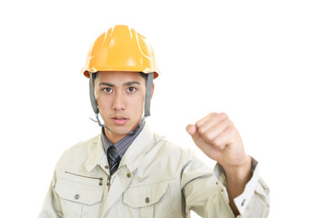 ガッツポーズの労働者