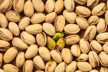 Roasted pistachio nuts seed as background