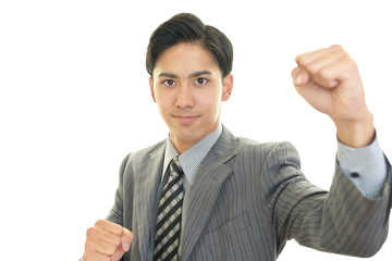 ガッツポーズのビジネスマン