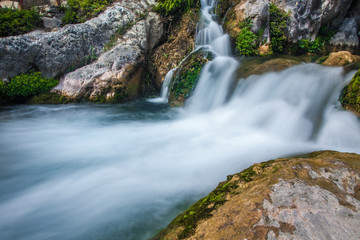 Fototapeta premium Waterfall with stones